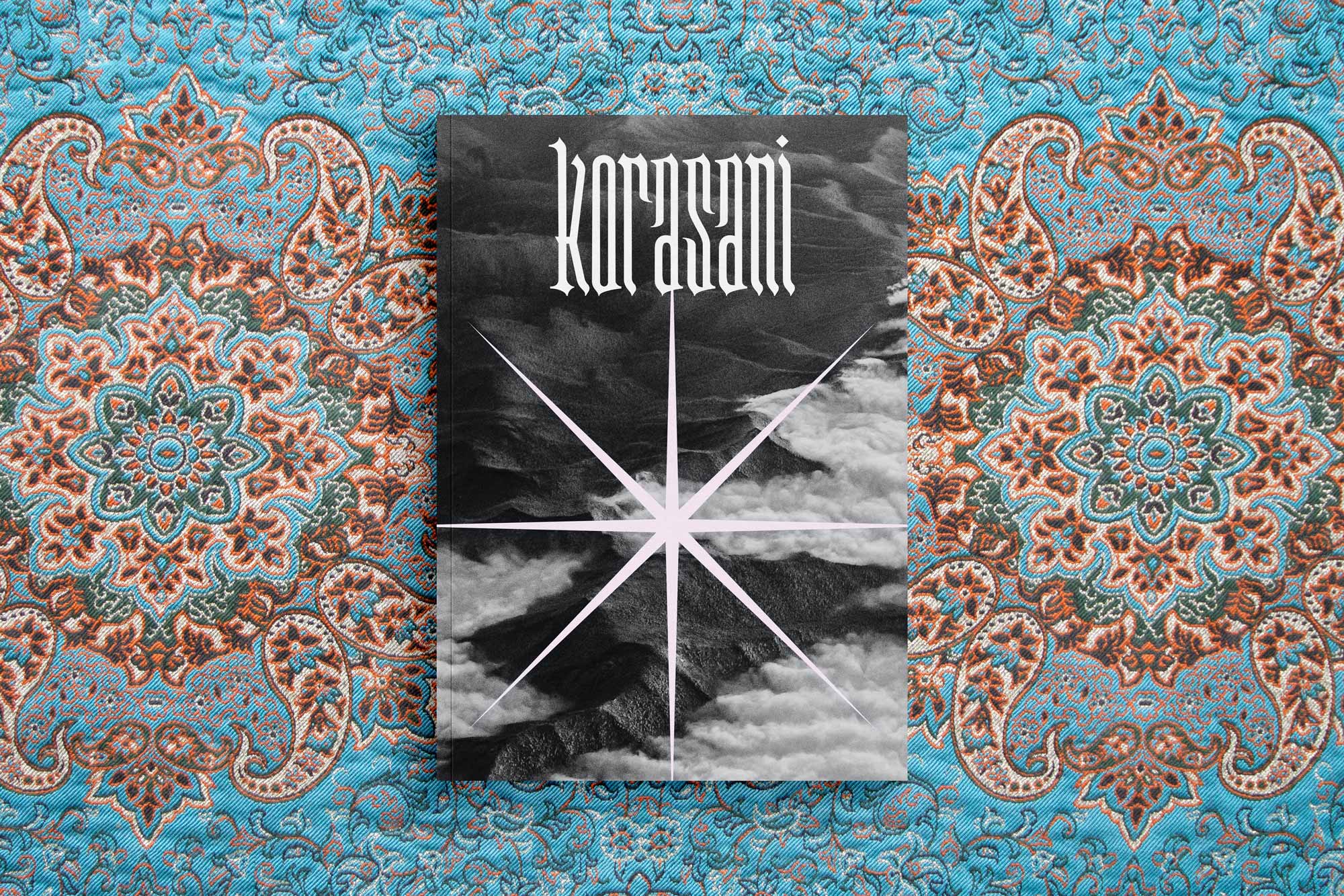 Korasani Brand Identity – Workbook Cover Design on Persian Rug